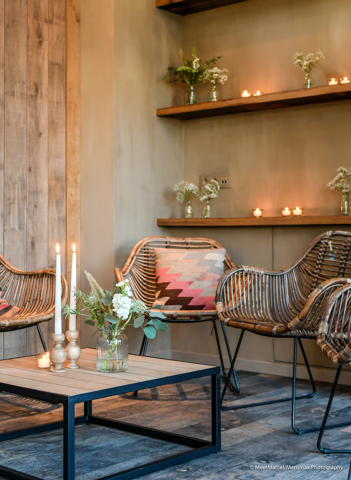 cosy lounge corner with candles and flowers