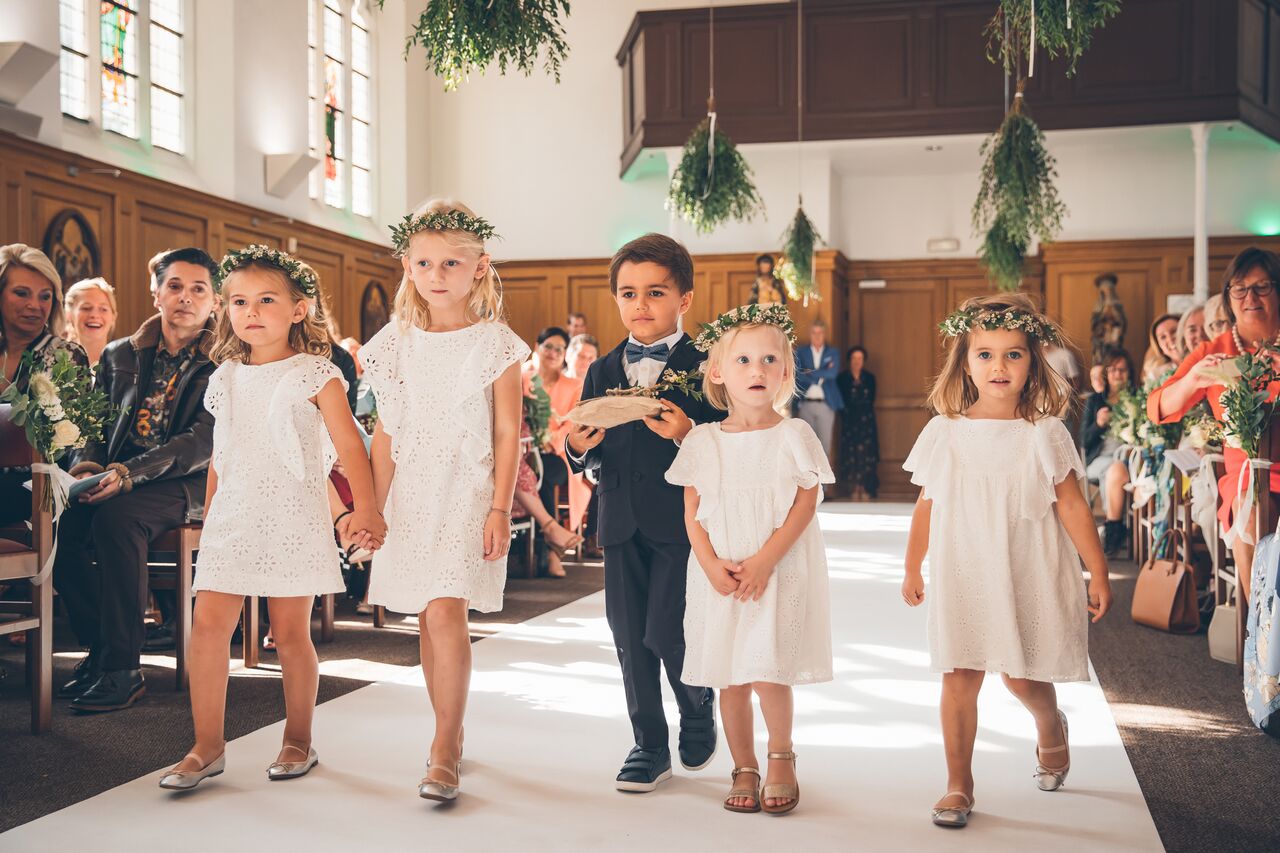 bridesmaids entering the church